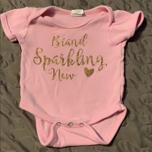 Brand Sparkling New onesie